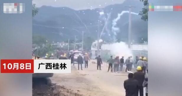 民间神操作！因土地纠纷两村村民互射烟花 头戴头盔上演全武行