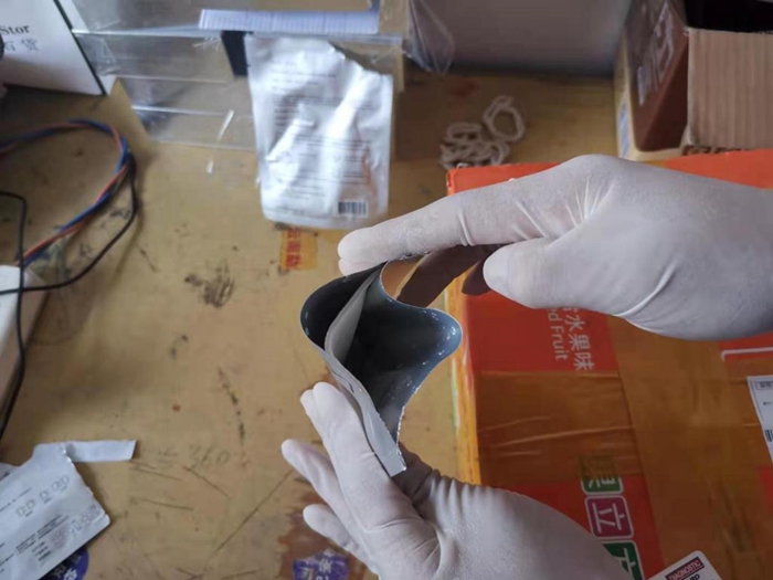 面膜藏毒,云南西双版纳查获液体状冰毒3.52千克