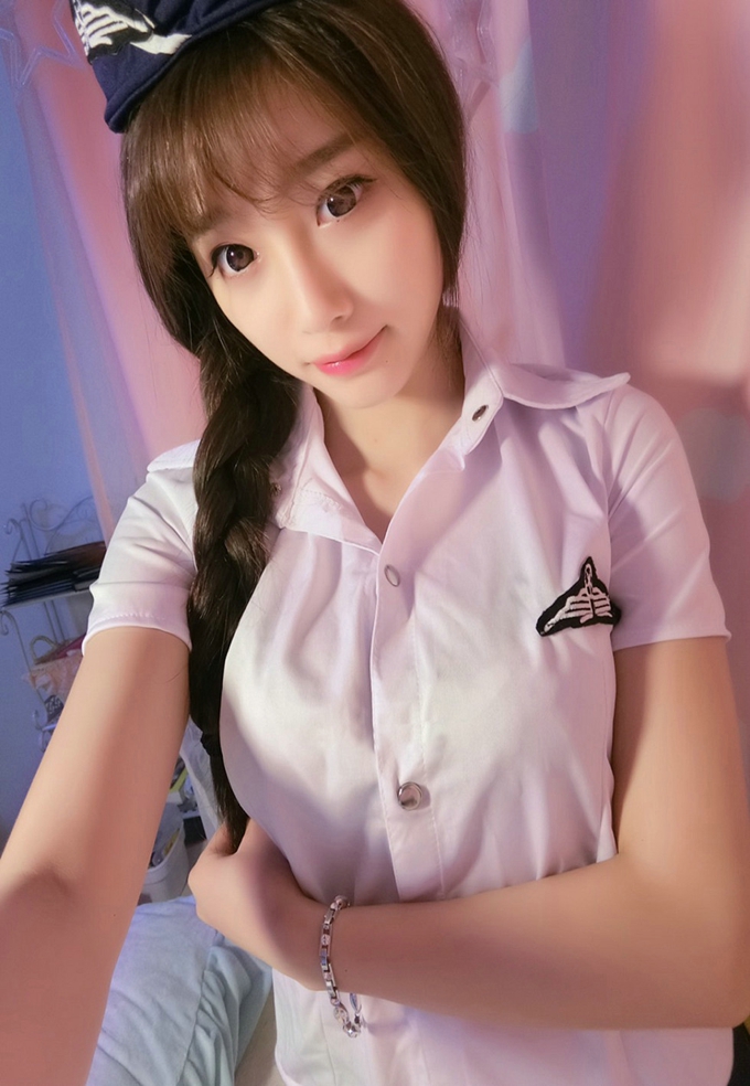 嫩模杨晨晨Sugar居家空姐制服爆乳诱惑丰润迷人气质写真